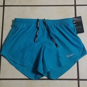 Green nike running shorts